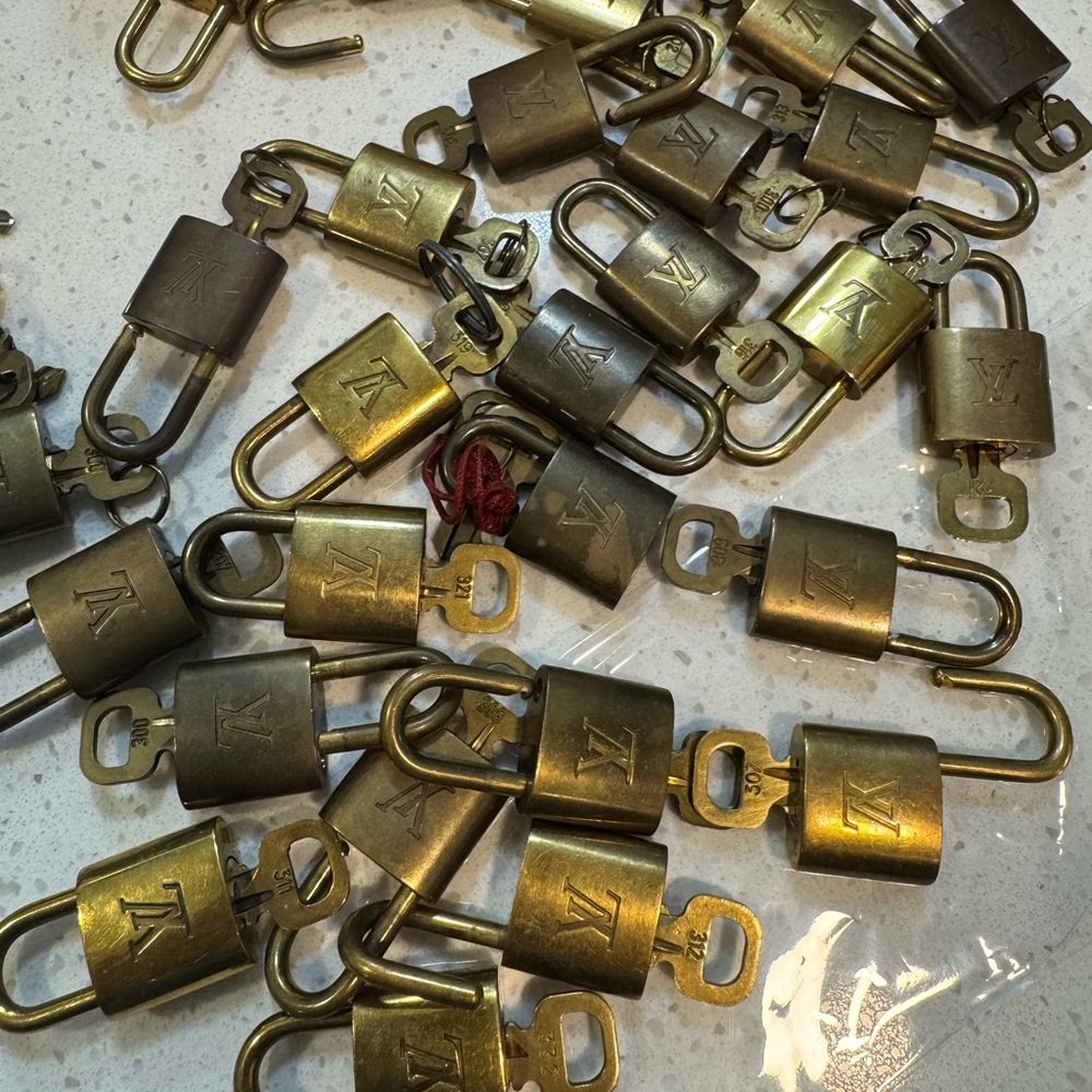 Authentic Louis Vuitton Gold and Brass Lockset